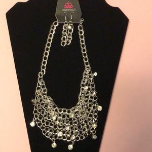 Silver necklace and silver earrings
